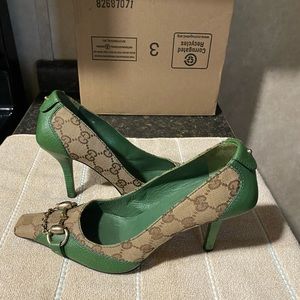 Authentic Gucci heels with signature GG pattern.